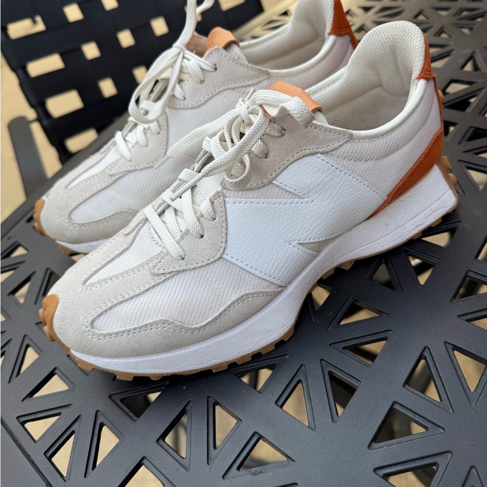 New Balance 327; white and rust color.